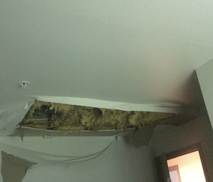 a hole cut out in a ceiling