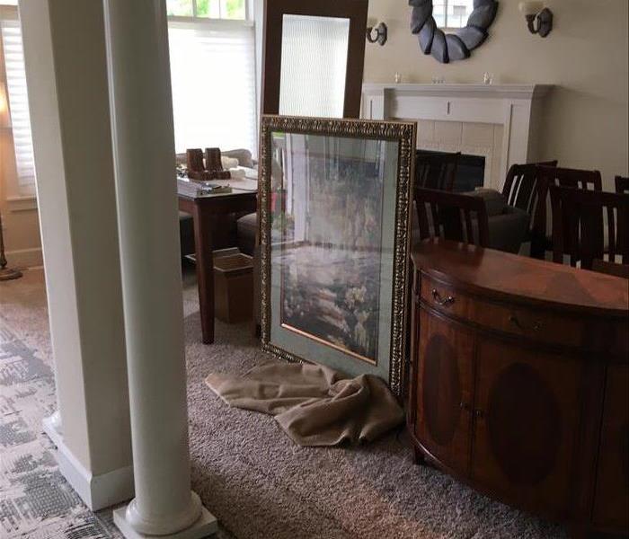 a living room with several pieces of furniture