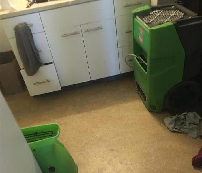green drying equipment in a bathroom
